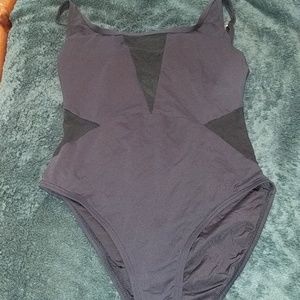 Black one piece with mesh cut outs